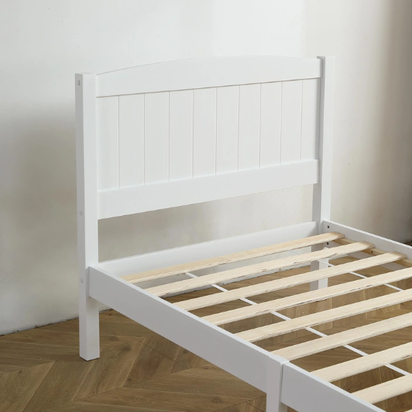 White twin platform bed frame with headboard, made of solid pine wood, featuring underbed storage and slatted base – minimalist design for kids, teens, or adults.

