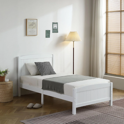White twin platform bed frame with headboard, made of solid pine wood, featuring underbed storage and slatted base – minimalist design for kids, teens, or adults.

