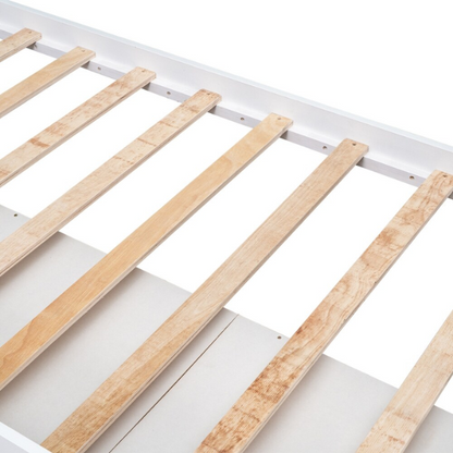 Solid white twin bed frame made from pine wood with underbed storage drawers and a non-toxic finish, designed for children or teens in a modern or rustic bedroom.

