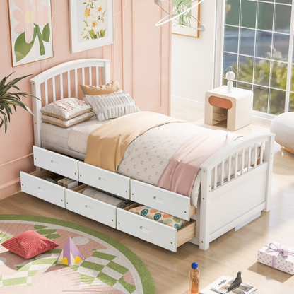 Solid white twin bed frame made from pine wood with underbed storage drawers and a non-toxic finish, designed for children or teens in a modern or rustic bedroom.

