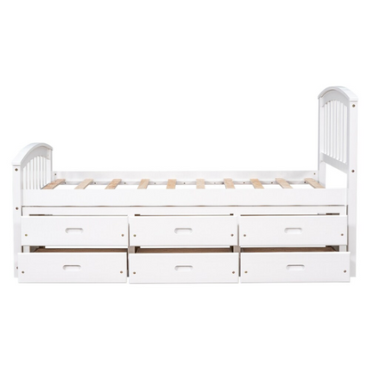 Solid white twin bed frame made from pine wood with underbed storage drawers and a non-toxic finish, designed for children or teens in a modern or rustic bedroom.

